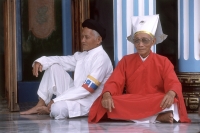 Vietnam, Tay Ninh, Cao Dai priests in Cao Dai Great Temple. - Steve Raymer