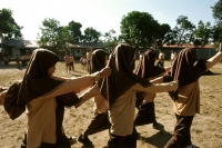 Indonesia, Lombok, Muslim girls marching in school. - Steve Raymer