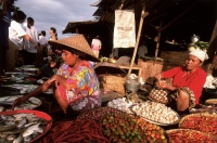 Malaysia, Kuala Lumpur, women at market. - Steve Raymer