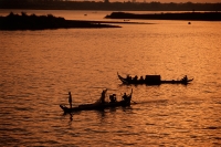 Cambodia, Phnom Penh, boats on Mekong River. - Steve Raymer