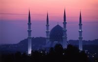 Malaysia, Shah Alam, Sultan Salahuddin Abdul Aziz Shah Mosque at sunset. - Steve Raymer