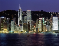 China, Hong Kong skyline, view from across harbor, night view - Stuart Woods