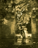 Indonesia, Bali, Balinese dancer in traditional costume, in garden - Jack Hollingsworth