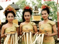 Indonesia, Bali, women dancers in traditional costume. - Jack Hollingsworth