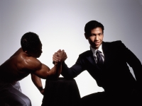 Two men arm wrestling, white background - Eric Ceret