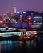 Hong Kong, Night view of Wanchai over Star Ferry. - Stuart Woods
