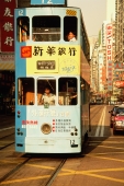 China, Hong Kong, Wanchai, Trams in traffic - Gareth Jones