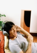 Man listening to headphones - Jade Lee