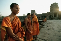 Cambodia, Angkor Wat, Young monks on stone path to temple - Jill Gocher