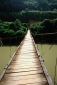 Vietnam, North tribal area,  footbridge spanning river - Jill Gocher