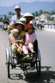Vietnam, Central, Family riding in cyclo - Jill Gocher