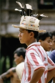 Malaysia, Sarawak, modern Iban boy wearing hat - Jill Gocher