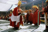 China, Szechuan (Sichuan), Kham region, Monks at ceremony performing lama dance. - Jill Gocher