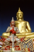 Thailand, Ko Samui, Golden Buddha and statue. - James Marshall