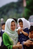 Malaysia, Muslim woman and her child. - Steve Raymer
