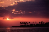 Indonesia, Lombok, Sunset over the water. - Steve Raymer