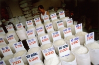 Vietnam, Ho Chi Minh City, rice and other grains for sale. - Steve Raymer