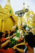 Myanmar (Burma), Yangon (Rangoon), Visitors at the Shwedagon Pagoda. - Steve Raymer