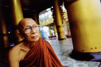 Myanmar (Burma), Yangon (Rangoon), An elderly Buddhist monk sitting at a meditation center. - Steve Raymer