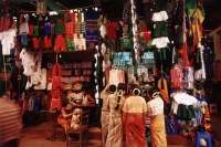 Myanmar (Burma), Yangon (Rangoon), Shoppers examining Chinese-made consumer goods in a market. - Steve Raymer