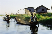 Myanmar (Burma), Fishermen in boats on Inle Lake - John McDermott