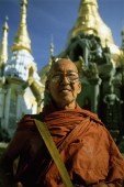 Myanmar (Burma), Yangon (Rangoon), Portrait of Buddhist monk at Shwedagon Pagoda - John McDermott