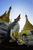 Myanmar (Burma), Yangon (Rangoon), Statue of Buddha at Shwedagon Pagoda - John McDermott