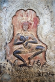 Cambodia, Siem Reap, Stone carving on wall in the Temples of Angkor - John McDermott