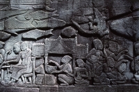 Cambodia, Siem Reap, Stone carvings on wall in the Temples of Angkor - John McDermott