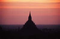 Myanmar (Burma), Dawn over a temple in Bagan - John McDermott