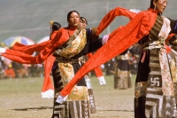 China, Szechuan (Sichuan), Kham region, Tibetan dancers performing at festival. - Jill Gocher