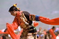 China, Szechuan (Sichuan), Kham region, Tibetan dancer performing at festival. - Jill Gocher