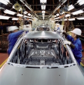 Malaysia, Kuala Lumpur, Proton auto factory, Proton cars on automated assembly line. - Alex Mares-Manton