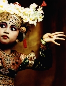 Indonesia, Bali, Amlapura, Legong dancer in dance position. - Martin Westlake
