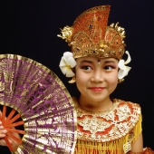 Indonesia, Bali, Ubud, Panji Semirang dancer in full costume holding fan. - Martin Westlake