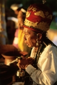 Indonesia, Bali, Gianyar, Pengastian ceremony, high priest leads communal prayers. (grainy) - Martin Westlake