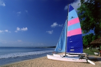 Indonesia, Bali, Jimbaran Bay, Sail boat on beach. (grainy) - Martin Westlake