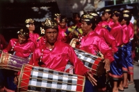 Indonesia, Bali, Tanjung Benoa, Drum players at Melasti ceremony. (grainy) - Martin Westlake