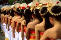 Indonesia, Bali, Gianyar, Cremation ceremony, procession of teenage girls. (grainy) - Martin Westlake