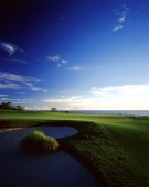 Indonesia, Bali, Tanah Lot, 14th green towards Indian Ocean Nirwana Bali Golf Club. (grainy) - Martin Westlake