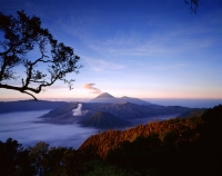 Indonesia, Java, Mount Bromo, Sunrise across Bromo-Semeru caldera from Mount Penanjakken. (grainy) - Martin Westlake