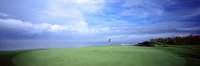 Indonesia, Bali, Tanah Lot, 13th green towards Indian Ocean Nirwana Bali Golf Club. (grainy) - Martin Westlake