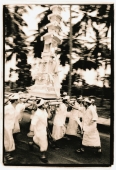 Indonesia, Bali, Gianyar, Men carrying funeral tower (bade) to temple. (artistic grain) - Martin Westlake