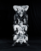 China, Hong Kong, Acrobats of the Shenyang Acrobatic Troupe performing balancing act - Carsten Schael