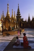 Myanmar (Burma), Yangon, Women worshippers at Shwedagon Paya. - Martin Westlake