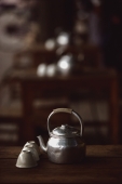 Myanmar (Burma), Pyay, Teapot and upturned cups at roadside teashop. - Martin Westlake