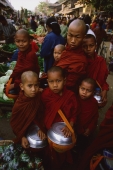 Myanmar (Burma), Sangaing, Young novice monks at Sangaing market. - Martin Westlake