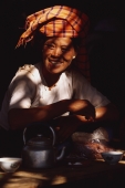 Myanmar (Burma), Inle lake, Paluang woman in teashop at 5 day market. - Martin Westlake