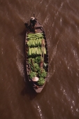 Vietnam, Can Tho, Hau river, Vegetable sellers passing under bridge, floating market. - Martin Westlake