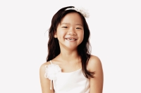 Girl in white dress smiling, portrait. - Erik Soh